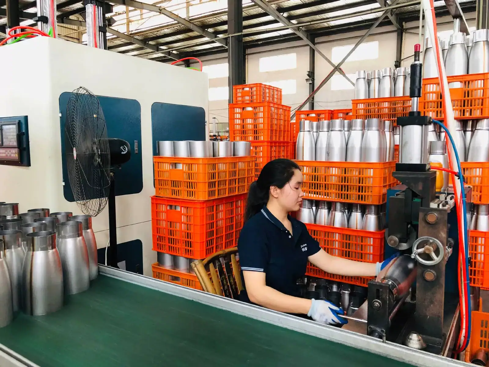 Custom drinkware assembly team working on the production line